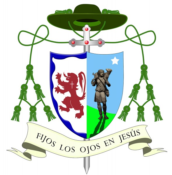 El escudo oficial de padre obispo Rubén luce un capelo o sombrero verde con dos grupos de seis borlas colgando por bandas.  A la sombra, la cruz procesional adornada con piedras rojas, según la norma de la heráldica eclesiástica. 